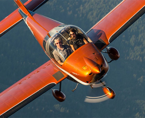 Pilots wearing Zulus in an orange plane
